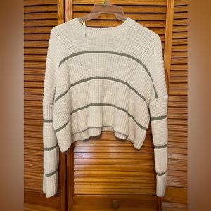 Cropped cable knit sweater
